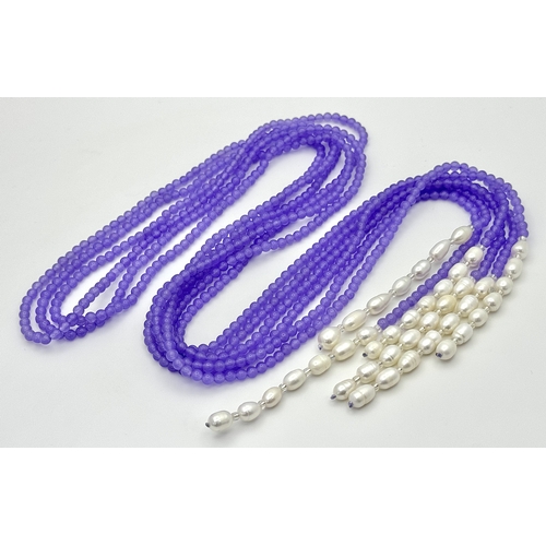 778 - An Alexandrite and Pearl Scarf Necklace. Each strand of three measuring 128cm.
