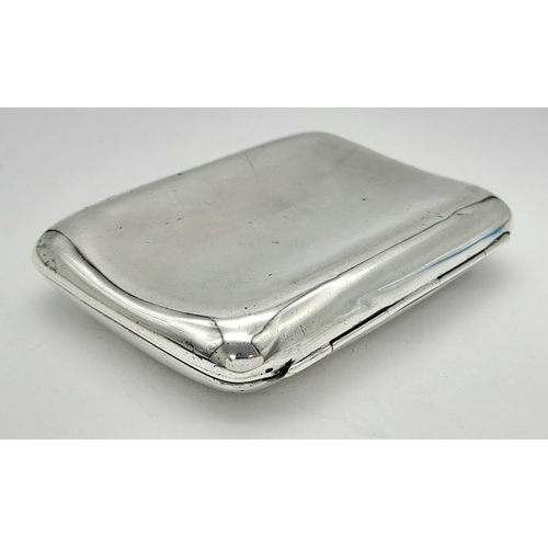 921 - An antique sterling silver cigarette case. Full Birmingham hallmarks, 1912. Total weight 75.6G. 9.5 ... 