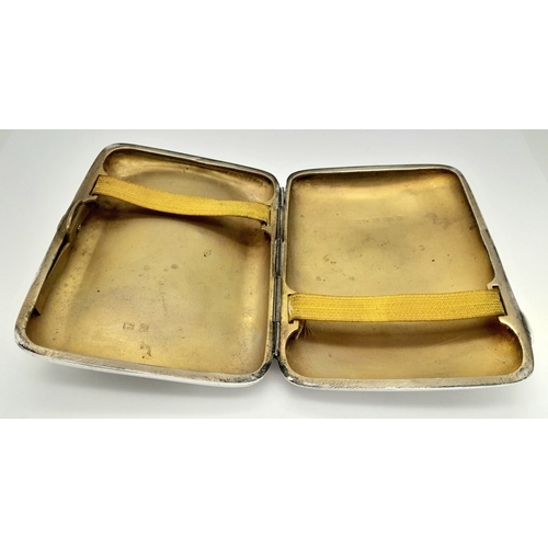 921 - An antique sterling silver cigarette case. Full Birmingham hallmarks, 1912. Total weight 75.6G. 9.5 ... 