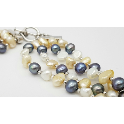 977 - A gorgeous 925 silver Natural Shell and Pearls multi-strand T-bar necklace. Total weight 132.5G. Tot... 