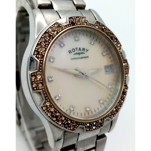 1004 - ROTARY STEEL STONE SET BRACELET WATCH WITH DATE FUNCTION AND MOTHER OF PEARL DIAL. IN FULL WORKING O... 