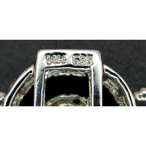 128 - A 14K White Gold Diamond Swirl Tennis Bracelet. c 1.5ctw of round brilliant cut diamonds in a swirl ... 