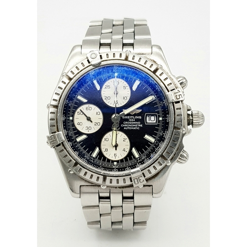 151 - A BREITLING 1884 CROSSWIND CHRONOMETRE AUTOMATIC GENTS WATCH. MODEL A13355. STAINLESS STEEL BRACELET... 