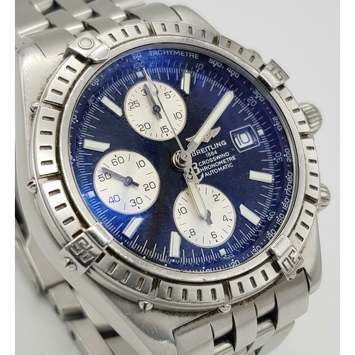 151 - A BREITLING 1884 CROSSWIND CHRONOMETRE AUTOMATIC GENTS WATCH. MODEL A13355. STAINLESS STEEL BRACELET... 