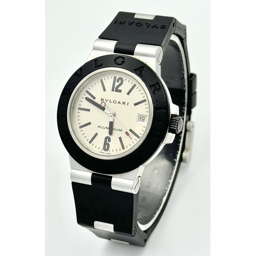 158 - WITHDRAWN- A BVLGARI 'LA MAMMA' SWISS AUTOMATIC ALUMINIUM AND RUBBER STRAP GENTS WATCH. MODEL AL38A.... 