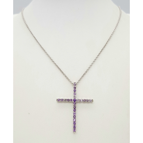 171 - An 18K White Gold Amethyst Set Cross on an 18K White Gold Chain. 4cm and 42cm. 6.8g total weight. Re... 