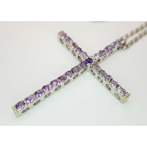 171 - An 18K White Gold Amethyst Set Cross on an 18K White Gold Chain. 4cm and 42cm. 6.8g total weight. Re... 