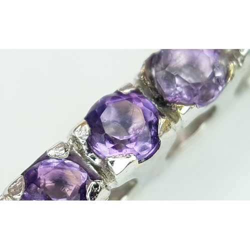 171 - An 18K White Gold Amethyst Set Cross on an 18K White Gold Chain. 4cm and 42cm. 6.8g total weight. Re... 