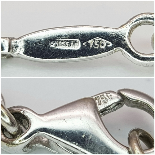 171 - An 18K White Gold Amethyst Set Cross on an 18K White Gold Chain. 4cm and 42cm. 6.8g total weight. Re... 