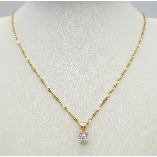 178 - A 9K Gold and Diamond Pendant on an 18K Gold Yellow Chain. Round brilliant cut diamond - 0.15ct. 1cm... 