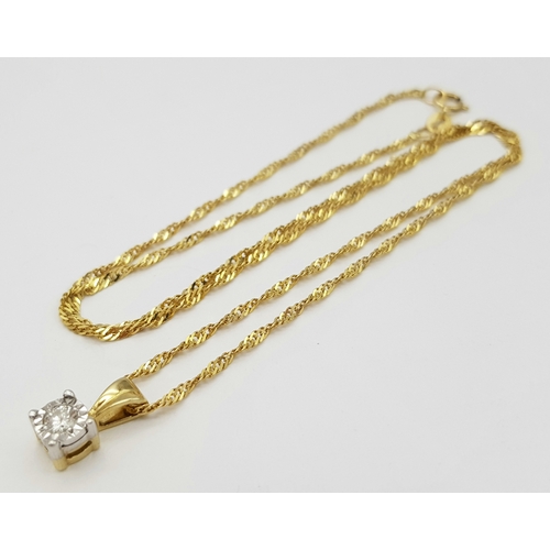 178 - A 9K Gold and Diamond Pendant on an 18K Gold Yellow Chain. Round brilliant cut diamond - 0.15ct. 1cm... 