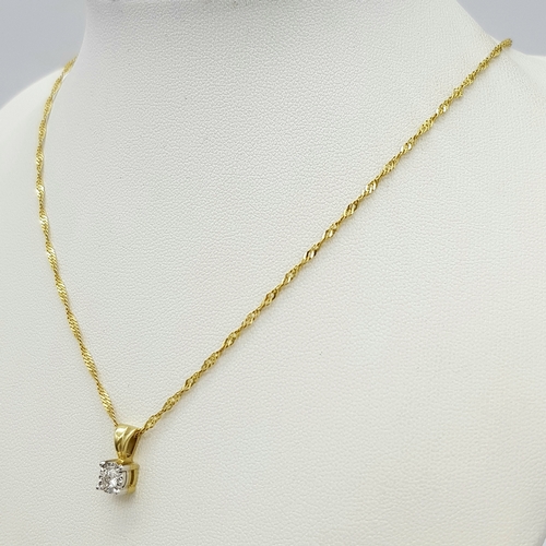 178 - A 9K Gold and Diamond Pendant on an 18K Gold Yellow Chain. Round brilliant cut diamond - 0.15ct. 1cm... 