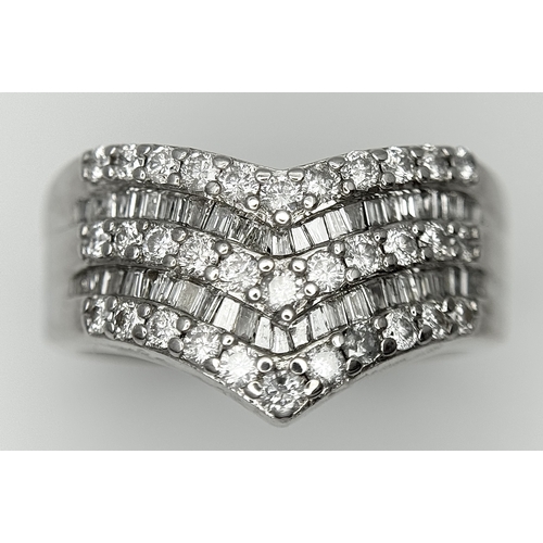 180 - AN 18K WHITE GOLD FIVE ROW DIAMOND CHEVRON SHAPED RING. 0.75CTW OF ROUND AND TAPERED BAGUETTE DIAMON... 
