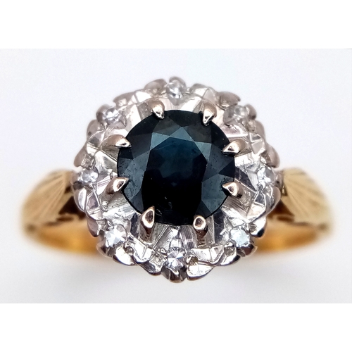 233 - AN 18K YELLOW GOLD DIAMOND AND SAPPHIRE RING. 4G. SIZE M. SPSA-3015.