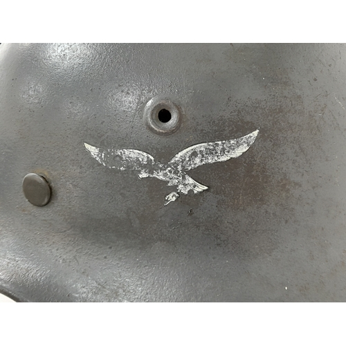 300 - WW2 German Luftwaffe Single Decal M40 Helmet and Liner. All 100% original. The decal has had the swa... 