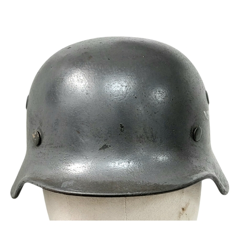 300 - WW2 German Luftwaffe Single Decal M40 Helmet and Liner. All 100% original. The decal has had the swa... 
