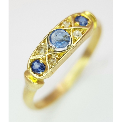 549 - An 18k yellow gold diamond and sapphire ring, 0.02ct diamond weight, 0.21ct sapphire weight, 2.1g to... 