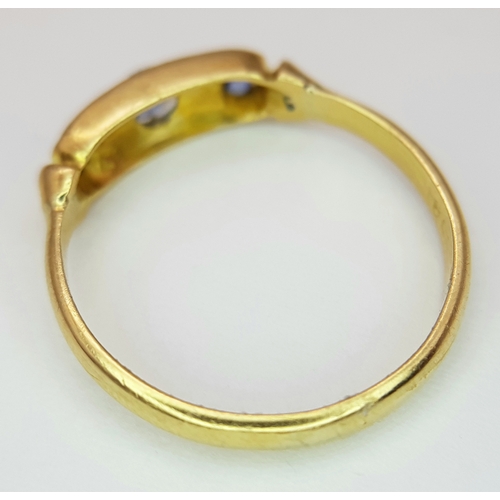 549 - An 18k yellow gold diamond and sapphire ring, 0.02ct diamond weight, 0.21ct sapphire weight, 2.1g to... 