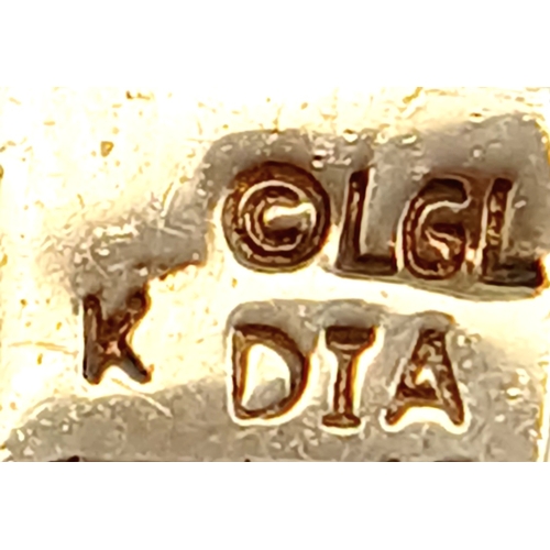 723 - A 9k yellow gold diamond and green stone pendant, 0.05ct diamond weight, total weight 1.3g. 2177I