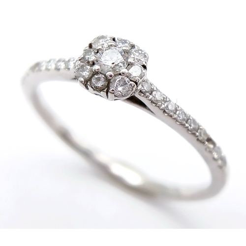 775 - A 9K WHITE GOLD DIAMOND SET RING. TOTAL WEIGHT 1.3G, SIZE L. SC 9082