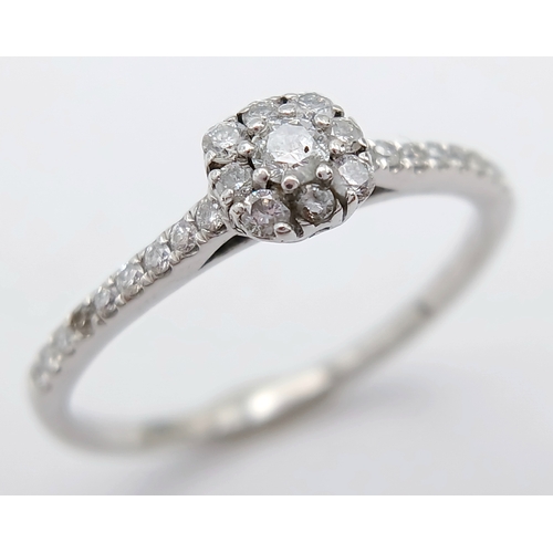 775 - A 9K WHITE GOLD DIAMOND SET RING. TOTAL WEIGHT 1.3G, SIZE L. SC 9082