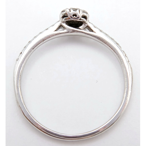 775 - A 9K WHITE GOLD DIAMOND SET RING. TOTAL WEIGHT 1.3G, SIZE L. SC 9082