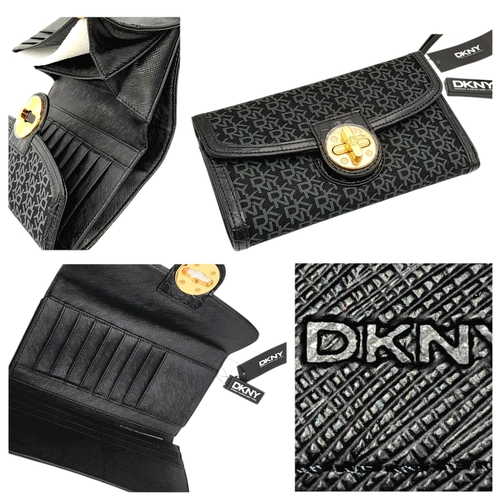 935 - A matching set of DKNY shoulder bag (34X18 cm), purse (19.5 X12 cm) and an umbrella. In very good co... 