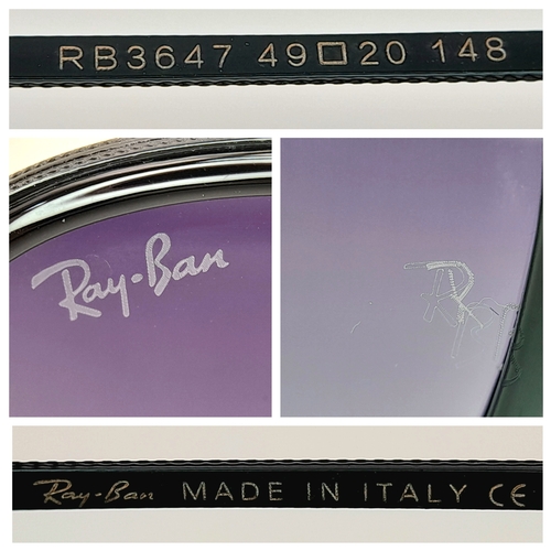 956 - A pair of RayBan black frame sunglasses, in original packaging.