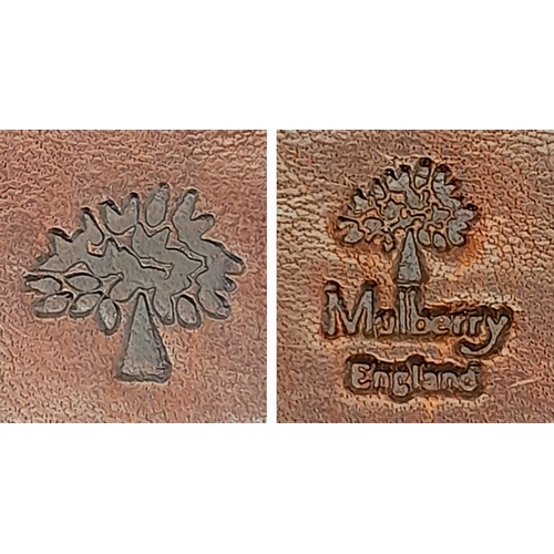 963 - A Mulberry burgundy cards and photos holder. 12 X 10 cm.