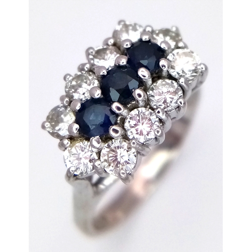 170 - AN 18K WHITE GOLD DIAMOND AND SAPPHIRE RING. 0.50CTW DIAMONDS. 4.9G, SIZE N. SPSA-3021.