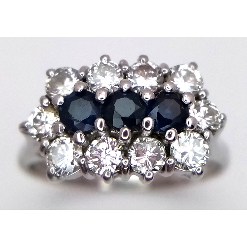 170 - AN 18K WHITE GOLD DIAMOND AND SAPPHIRE RING. 0.50CTW DIAMONDS. 4.9G, SIZE N. SPSA-3021.