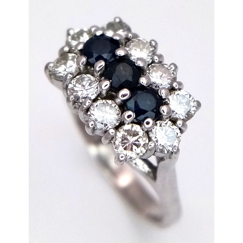 170 - AN 18K WHITE GOLD DIAMOND AND SAPPHIRE RING. 0.50CTW DIAMONDS. 4.9G, SIZE N. SPSA-3021.