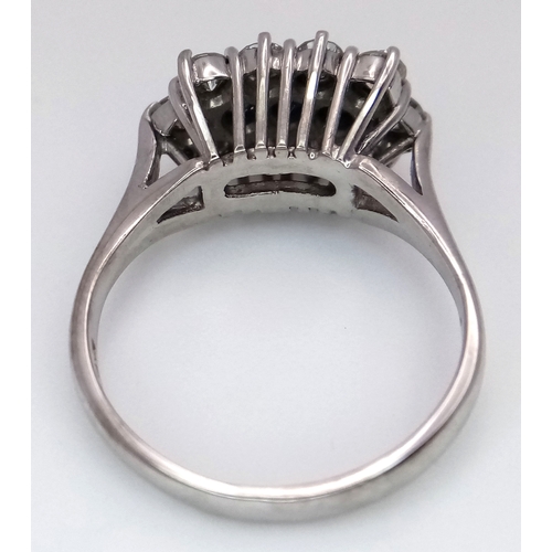 170 - AN 18K WHITE GOLD DIAMOND AND SAPPHIRE RING. 0.50CTW DIAMONDS. 4.9G, SIZE N. SPSA-3021.