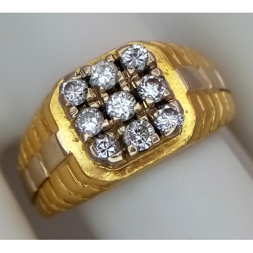 173 - AN 18K YELLOW GOLD DIAMOND SET RING. NINE ROUND BRILLIANT CUT DIAMONDS - 0.40CTW. 9G. SIZE T. SPSA-1... 
