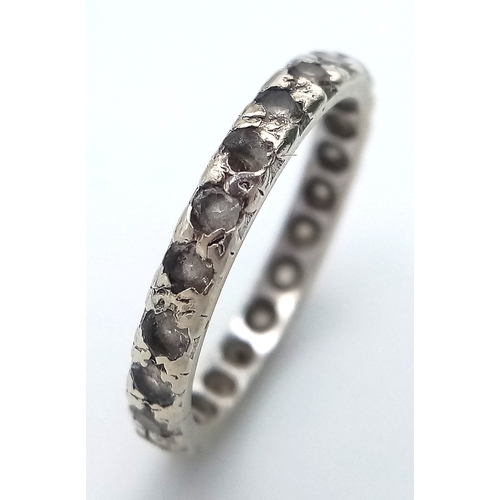 126 - Fully hallmarked 9 CARAT WHITE GOLD ETERNITY RING. 1.73 Grams. Size K - K 1/2. Please see pictures.