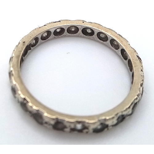 126 - Fully hallmarked 9 CARAT WHITE GOLD ETERNITY RING. 1.73 Grams. Size K - K 1/2. Please see pictures.