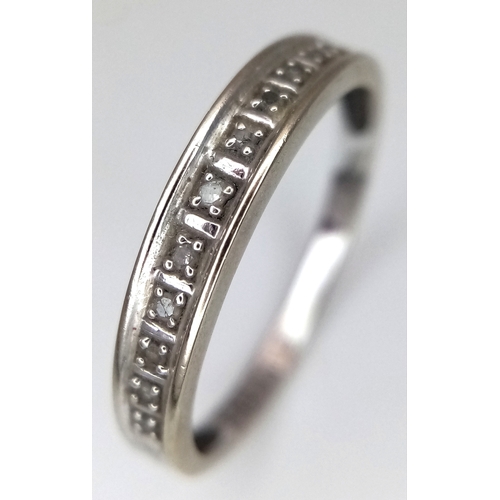 133 - Fully hallmarked 9 CARAT WHITE GOLD and DIAMOND RING . 1.47 grams. Size N - N 1/2. Please see pictur... 