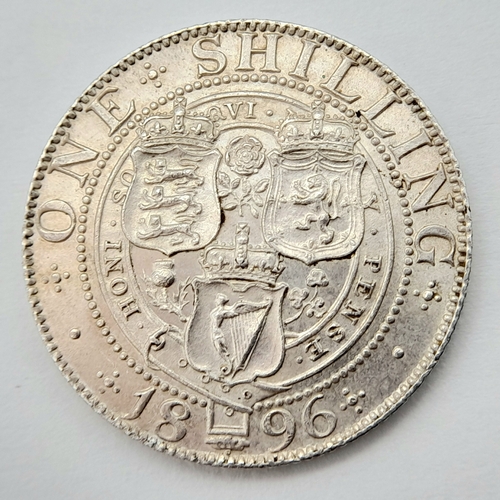 143 - A Queen Victoria 1896 Silver One Shilling Coin. Small rose. Near UNC.