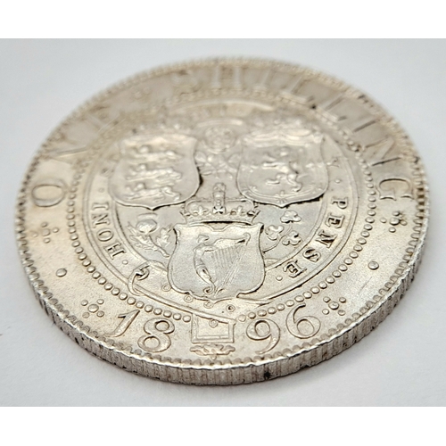 143 - A Queen Victoria 1896 Silver One Shilling Coin. Small rose. Near UNC.