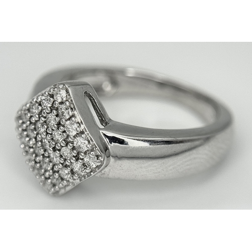 159 - A 14K WHITE GOLD DIAMOND RING. DIAMOND WEIGHT 0.25CT. TOTAL WEIGHT 4G. SIZE J. 8851