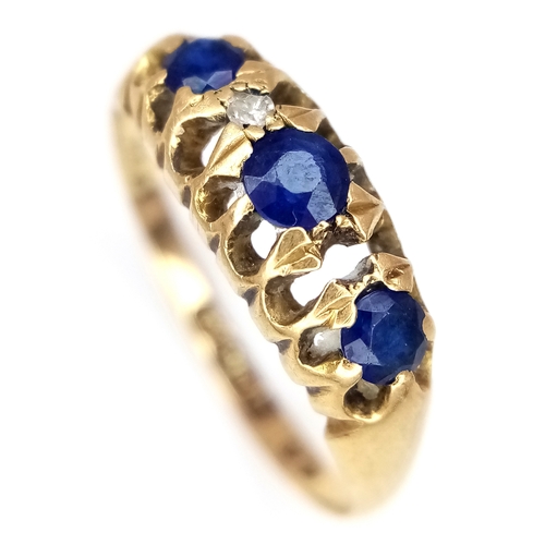 176 - AN 18K GOLD RING WITH SAPPHIRE AND DIAMONDS (ONE SMALL DIAMOND MISSING)      2.3gms    size N/O