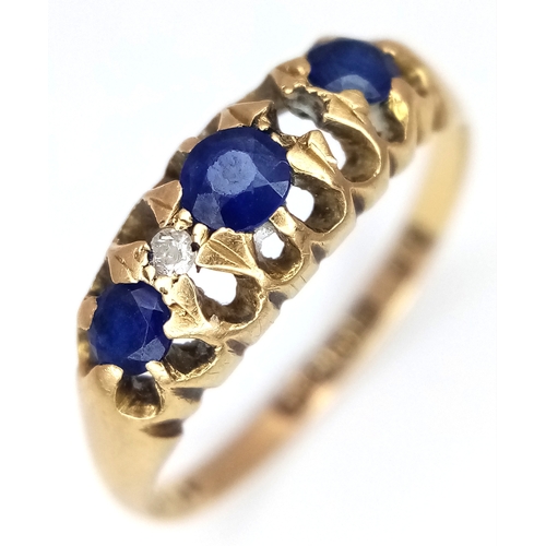 176 - AN 18K GOLD RING WITH SAPPHIRE AND DIAMONDS (ONE SMALL DIAMOND MISSING)      2.3gms    size N/O