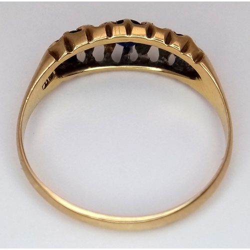 176 - AN 18K GOLD RING WITH SAPPHIRE AND DIAMONDS (ONE SMALL DIAMOND MISSING)      2.3gms    size N/O