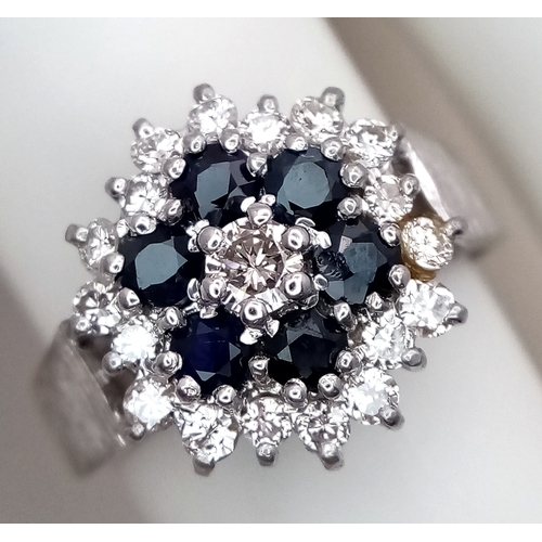 177 - AN 18K WHITE GOLD VINTAGE DIAMOND AND SAPPHIRE RING. 5G. SIZE N. SPSA-3024.