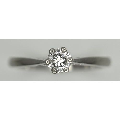 198 - A PLATINUM AND DIAMOND SOLITAIRE RING. 0.25CT. 6 CLAW SET. 3.4G. SIZE M. SPSA-3001.