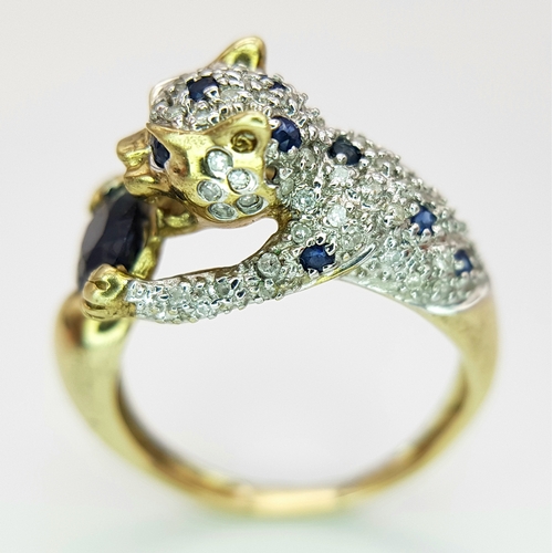 201 - A 9K YELLOW GOLD DIAMOND AND SAPPHIRE SET PANTHER RING. TOTAL WEIGHT 4G. SIZE N. SC 9006