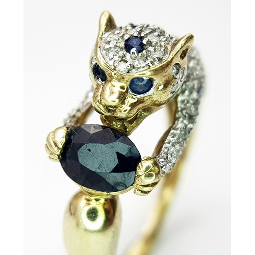 201 - A 9K YELLOW GOLD DIAMOND AND SAPPHIRE SET PANTHER RING. TOTAL WEIGHT 4G. SIZE N. SC 9006