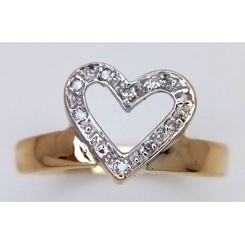 229 - AN 18K YELLOW GOLD DIAMOND SET HEART RING. TOTAL WEIGHT 3.1G, SIZE K. SC 9053