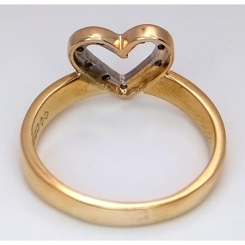 229 - AN 18K YELLOW GOLD DIAMOND SET HEART RING. TOTAL WEIGHT 3.1G, SIZE K. SC 9053