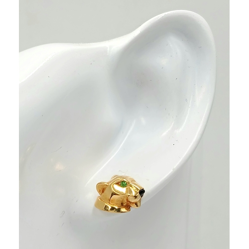 25 - A PAIR OF CARTIER PANTHER EARRINGS IN 18K GOLD WITH EMERALD EYES .    8.25gms